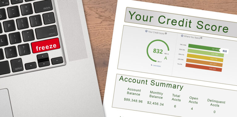 Laptop with Freeze on the red key by credit score report as concept for new law allowing free credit freezes with agencies